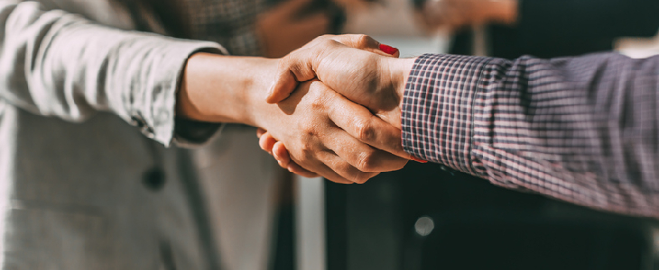 Two people shaking hands