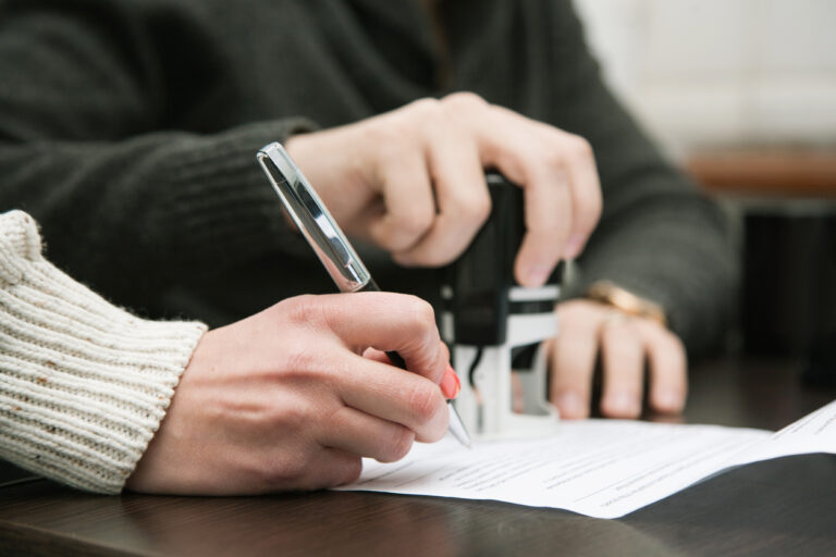 Notary public in office stamping document