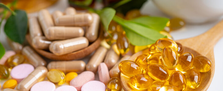 Alternative medicine herbal organic capsule with vitamin E omega 3 fish oil, mineral, drug with herbs leaf natural supplements for healthy good life.