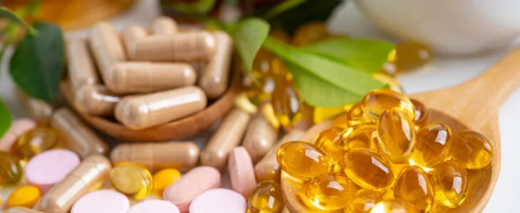 Alternative medicine herbal organic capsule with vitamin E omega 3 fish oil, mineral, drug with herbs leaf natural supplements for healthy good life.